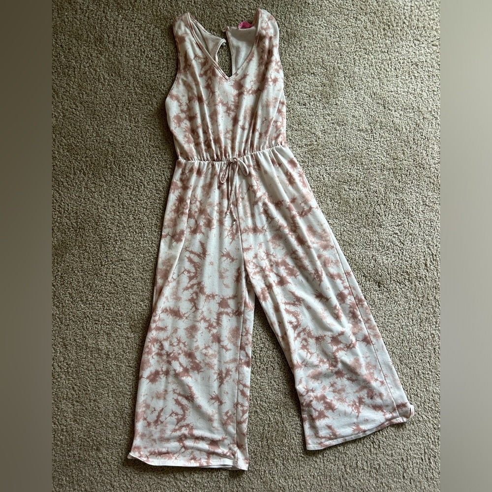 Light pink wide leg romper.